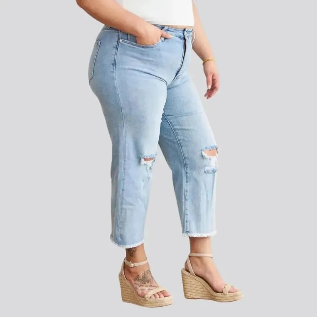 Distressed women's raw-hem jeans